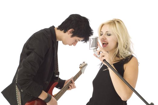 Woman singer and male guitarist in garage band isolated on white