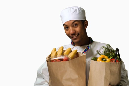 African American Chef with Groceries isolated on white