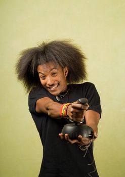 Young Enthusiastic African American Playing Holding a Joystick