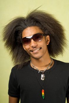 Close-Up of Happy Young African American Man Wearing Sunglasses