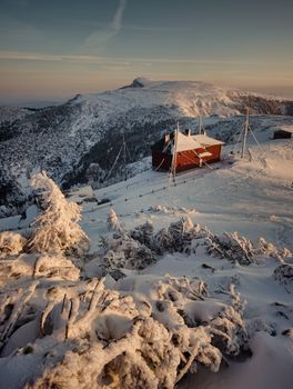 chalet on mountain in winter, Romanian Carpathians