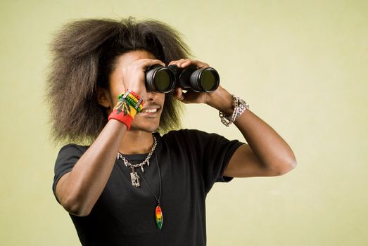 Trendy Young African American Posing with Binoculars