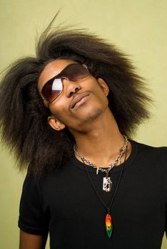 Close-Up of Happy Young African American Man Wearing Sunglasses