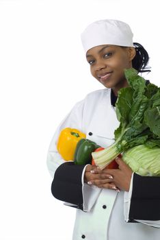Studio isolated woman female chef with green spinach, cabbage, red and yellow peppers on white