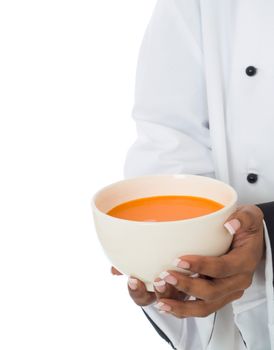 Chef hands and jacket holding or serving soup food isolated on white