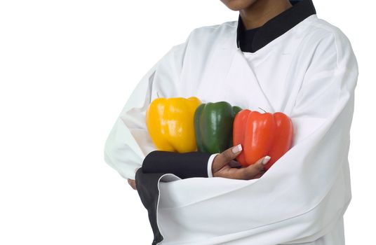 Studio isolated woman female chef with red and yellow peppers on white