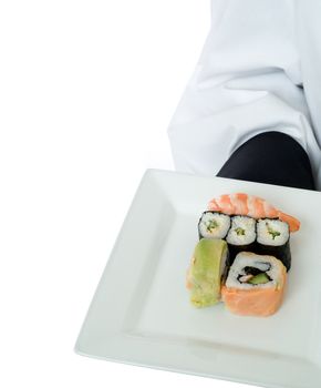 Chef or waiter serving sushi on white isolated plate