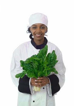 Studio isolated woman female chef and fresh green spinach vegetable