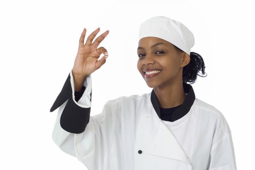 Happy female chef gives the ok or okay sign