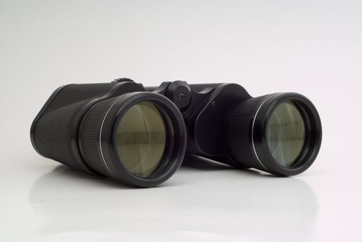 Clean black viewing binoculars on white background