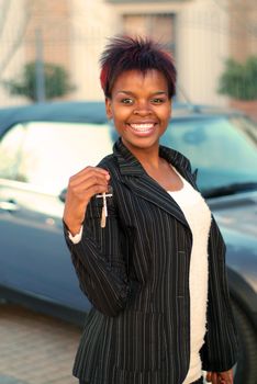 African American businesswoman happy with keys to new car