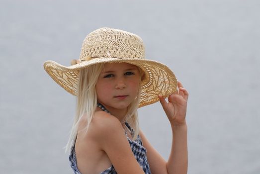 8 year old girl with hat. Please note: No negative use allowed
