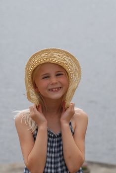 8 year old girl with hat. Please note: No negative use allowed