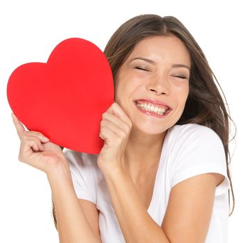 Love and valentines day woman holding heart smiling cute and adorable isolated on white background. Beautiful ethnic asian woman in love.