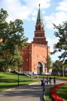 Summer view of the Alexander Garden and Borovitskaya Tower of Moscow Kremlin, Russia