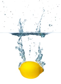 Fresh lemon falling into water. Isolated on white background
