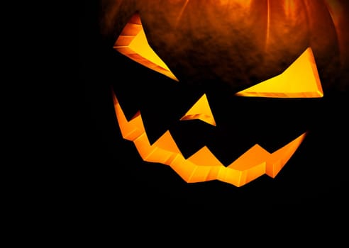 Jack O Lantern halloween pumpkin on black background. Close up with copy space. 3d render