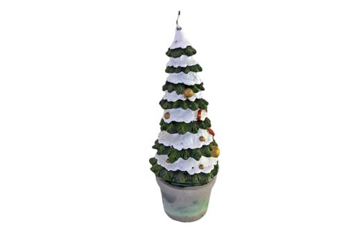 A christmas tree-shaped candle isolated on white