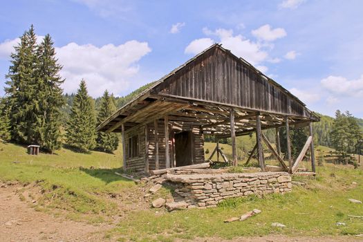 Portrait of an unfinished house on a meadow