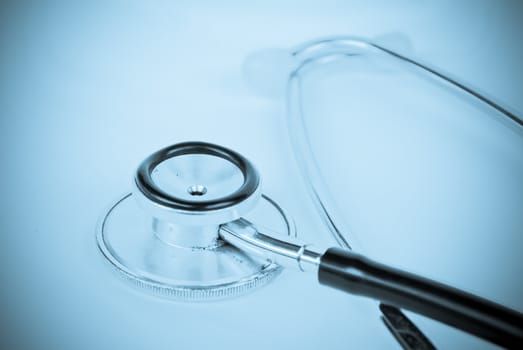 A stethoscope in front of medical