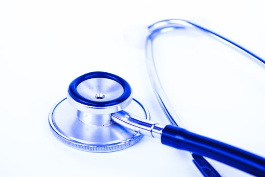 A stethoscope in front of medical