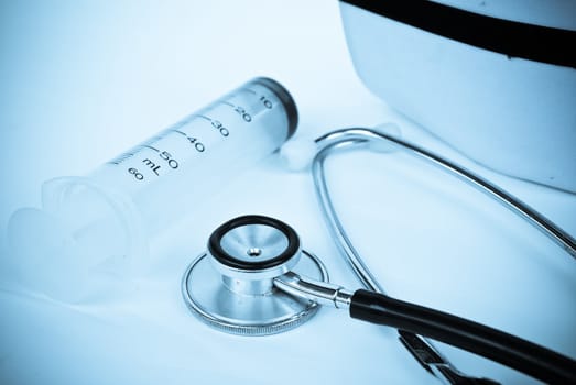 A stethoscope in front of medical