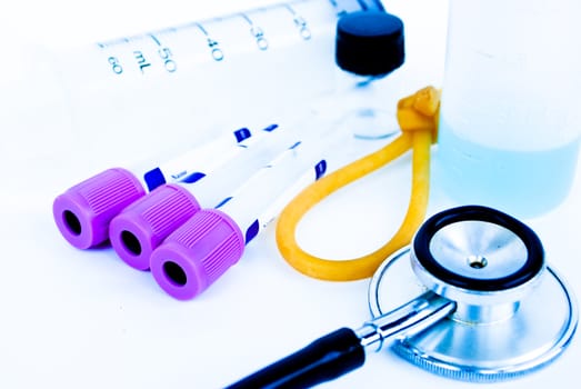 A stethoscope in front of medical
