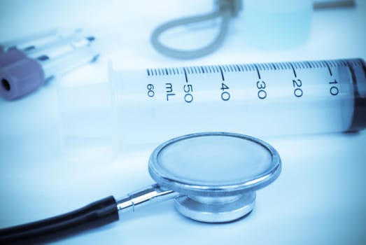 A stethoscope in front of medical