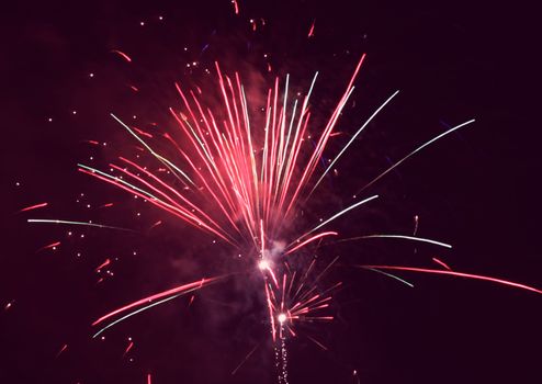 holiday fireworks in night sky