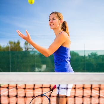 Portrait of a pretty young tennis player