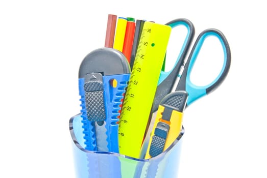 container with office supplies on white background