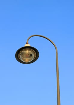 street light against a blue sky 