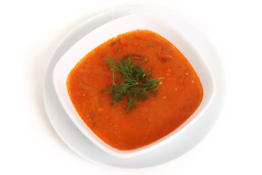 Image of bowl of hot red soup isolated on white background