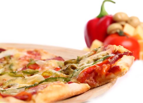 Image of sliced pizza in a plate and vegetables isolated over white background