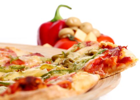 Image of sliced pizza in a plate and vegetables isolated over white background