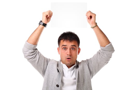 Young handsome man holding blank board ready for text on white background