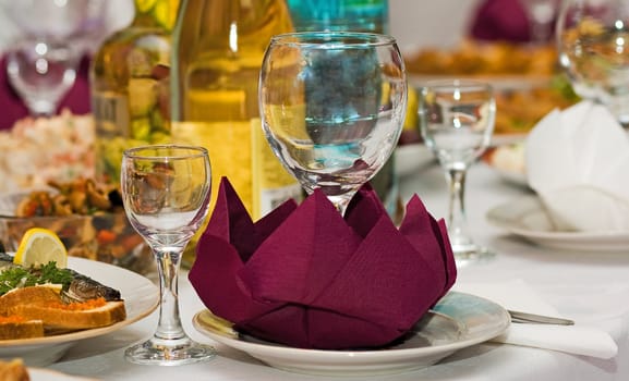 catering table set service with silverware, napkin and glass at restaurant before party