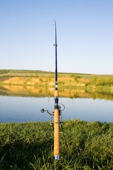 fishing in a calm swedish lake on a sunny day