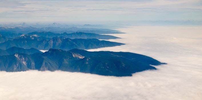Aerial view of west coast mountain ranges and fiords of Pacific Ocean in western province of beautiful British Columbia, Canada.