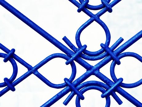 background or texture of hammer forged steel grid blue