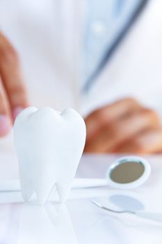 molar with dentist background ,dental concept