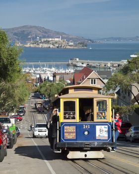 SAN FRANCISCO - NOVEMBER 2012: The Cable car tram, November 2nd, 2012 in San Francisco, USA. The San Francisco cable car system is world last permanently manually operated cable car system. Lines were established between 1873 and 1890.