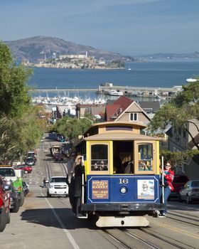 SAN FRANCISCO - NOVEMBER 2012: The Cable car tram, November 2nd, 2012 in San Francisco, USA. The San Francisco cable car system is world last permanently manually operated cable car system. Lines were established between 1873 and 1890.