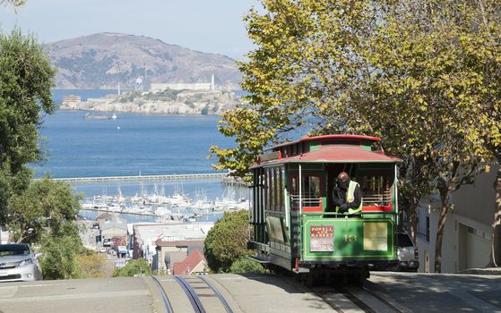 SAN FRANCISCO - NOVEMBER 2012: The Cable car tram, November 2nd, 2012 in San Francisco, USA. The San Francisco cable car system is world last permanently manually operated cable car system. Lines were established between 1873 and 1890.