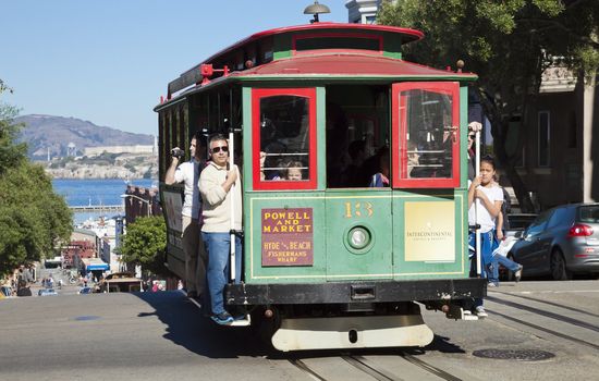 SAN FRANCISCO - NOVEMBER 2012: The Cable car tram, November 3rd, 2012 in San Francisco, USA. The San Francisco cable car system is world last permanently manually operated cable car system. Lines were established between 1873 and 1890.