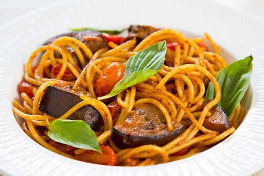Spaghetti with aubergine ,tomato and basil