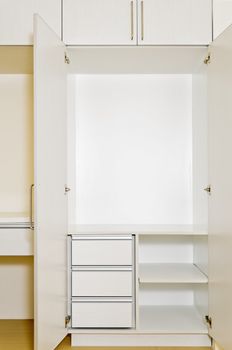 Built-in cabinet in room of an unoccupied newly-built apartment.