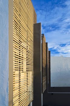 Exterior shot of contemporary apartment bathe in sunset