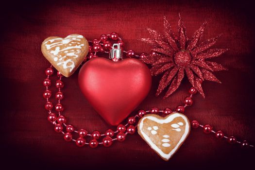 valentine hearts, flower and jewelery on red background