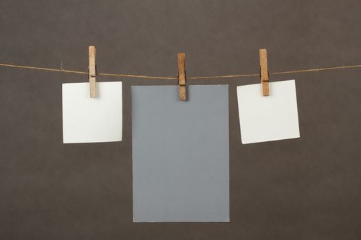 white memory note papers hanging on cord